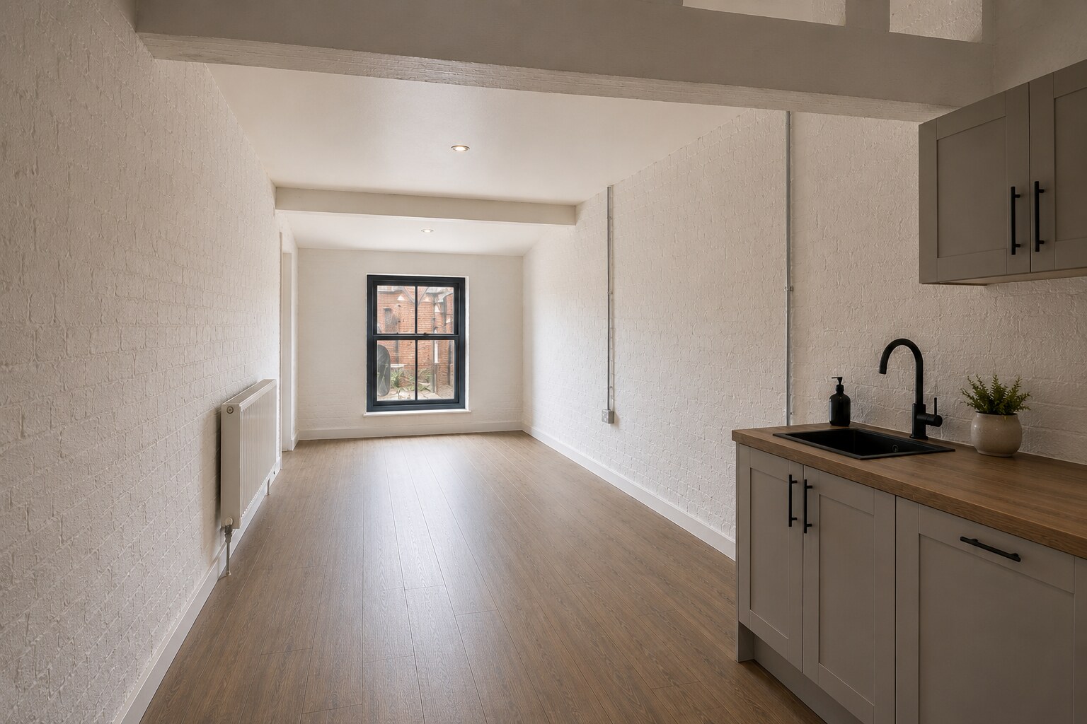 Landscape view of a fitted office and kitchenette