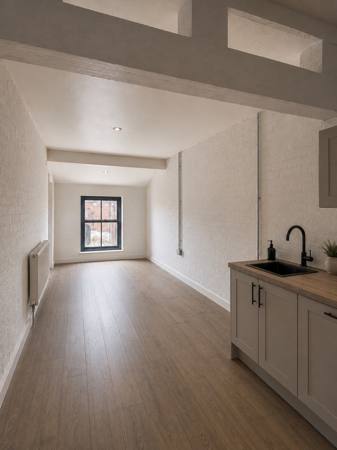 Portrait view of a fitted office with private kitchenette